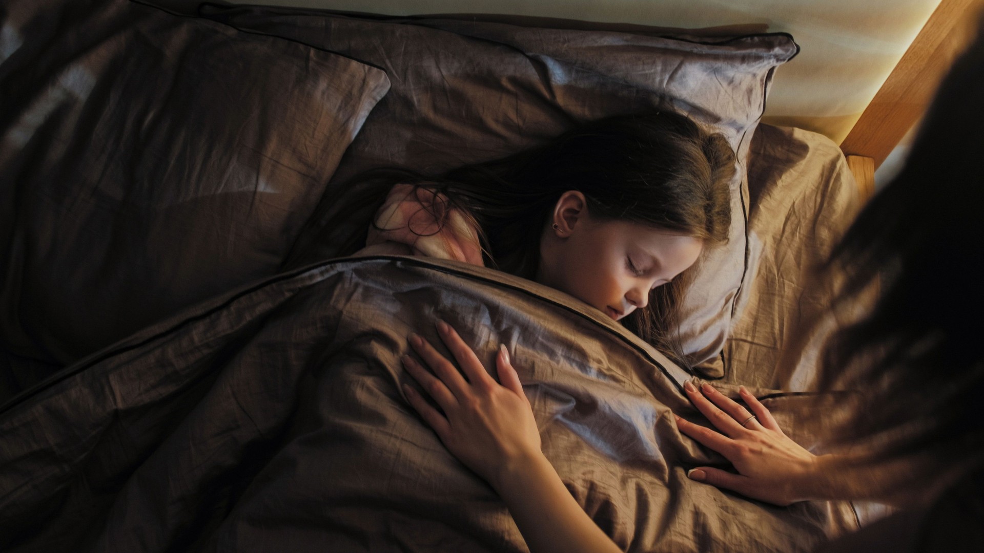 Sleeping child mother care night rest daughter